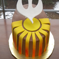 Ordination Small oval chocolate cake with raspberry filling, covered with chocolate buttercream. The design was based on the graphic used on the...