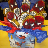 Spiderman Cookie Bouquet! Chocolate chip cookie Spiderman and web cookie bouquet. I used an egg shaped cutter for Spiderman, and round cutter for the webs. Decorated...