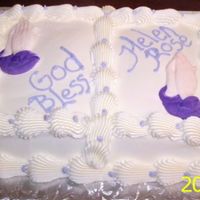 First Comm. this was a book cake with purple flower and pray hands
