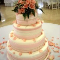 Fondant Ribbons This cake has two chocolate layers and two butter cake layers, both raspberry filled. I used MMF over buttercream, the fondant ribbons were...