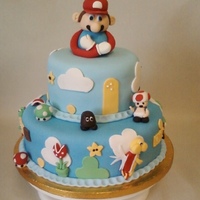 Super Mario Bros. Birthday This was for a little boys birthday! Everything was made with fondant.
