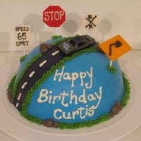 Road Signs Cake Buttercream cake with MMF street and signs. (car is plastic)