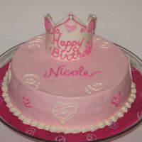 Princess Cake Buttercream cake with MMF crown and rolled BC pearls.