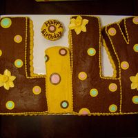 Lily's Birthday Cake for my niece's 5th birthday. The party theme was polka dots and her favorite color is yellow. Letters cut from chocolate cake (...