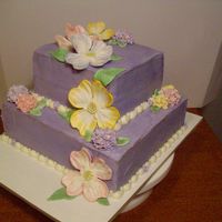 Dogwoods & Hydrangeas Buttercream with fondant/gumpaste mix flowers & leaves.