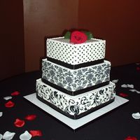 Black And White Transfer Wedding Cake This is my first square wedding cake. This was based on a pic of a cake the bride had found ina David's Bridal catalogue. The side...