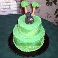 Gorilla Cake This was for my brother's birthday. He loves gorillas. It's a 6 i nch and 9 inch red velvet and lemon. The palm tree trunks are...