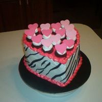 Zebra Heart This is from a design I found from Wilton. I changed it a bit with doing the zebra design on the heart. It's a 3 layer 9" heart...