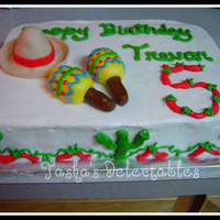 Mexican Birthday Made for a little guy who loves mexican food! Buttercream icing with gumpaste peppers, hat, and maracas.