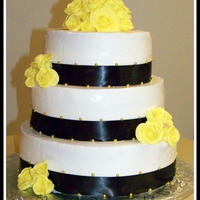 Brown & Yellow Wedding Cake Flowers are gumpaste roses.