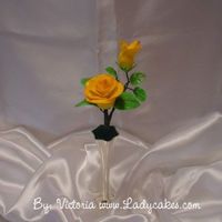 Yellow Rose Gumpaste yellow rose.. Entered this in to our county fair for a sugar art..