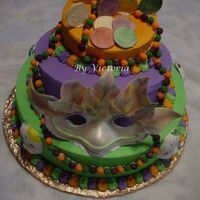 Mardi Gras - Fair Cake This is the cake that I am turning in for our County Fair the theme is Mardi Gras so this is what I came up with .. The mask is made out of...