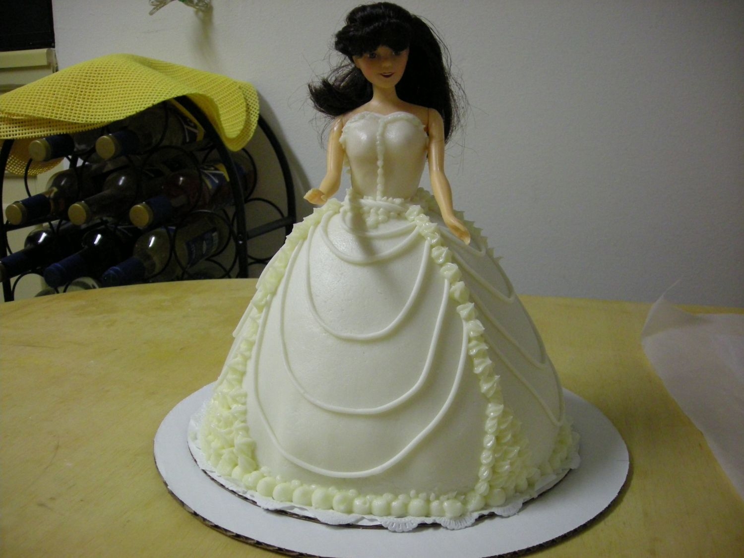 Dscn0611.jpg My first attempt at a doll cake. I was rushed and it was hot, Maybe next time I'll plan further ahead and have an idea how I want it...