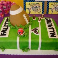 Crashing Football Cake This cake design was based off of one I saw right here on Cake Central. The football was made out of rice Krispies so it would keep it'...
