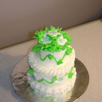 Jackie.jpg 2" and 3" round cakes, stacked. White cake with almond buttercream frosting.