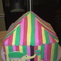 Circus Tent For 1st birthday to match invitations. Carved from 4 8" squares and 1 6" square. Wasnt sure about carving the top, but it worked...