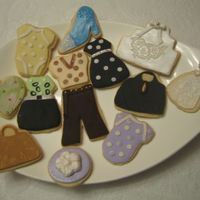 Fashion_Cookies.jpg Working on my fashion clothing line with cookies. Some I did in a class and the rest I pratice at home. I used fondant. I like using this...