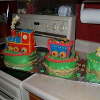 Train Cake I couldn't find a train cake pan, so I sculpted the train with Rice Crispie treats, and covered with fondant.