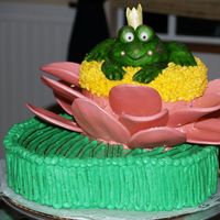 Frog Prince Cake View Sorry for the second upload. I love the idea of the lilypad with the flower, but would definantly use fondant next time for a neater look....