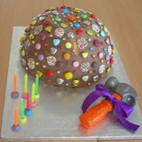 Smash 'n' Grab birthday girl had to smash throught the chocolate shell to get to the cake!