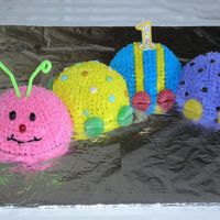 Caterpillar Cake First official event cake after taking classes. Also, my daughter's first birthday cake. It was easy and fun!!