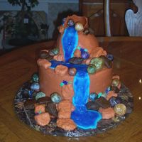 Mountain Cake Inspired by Kats0916 from this website. Butter cake with buttercream frosting. Rocks are make with rice cripie treats wrapped in fondant...