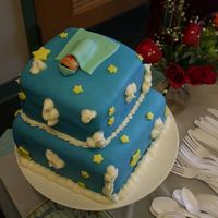Sleeping Baby Cake. Top tier is double chocolate cake with mocha buttercream. Bottom tier is yellow cake with raspberry cheesecake filling and vanilla...