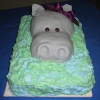 Hippo! Hippo Birthday cake for my Maw Maw's 80th Birthday. Buttercream water. Fondant Hippo. Hippo was hand molded out of rice krispies....
