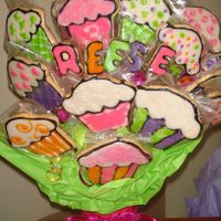 Reese 3Bd Cookie Bouquet NFSC w/ Toba's glaze.My first time using Toba's glaze and it taste pretty good. My first time w/ cupcake cookies. After seeing...