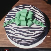Teen Zebra Birthday Cake With Bow Zebra birthday cake with green bow, covered and decorated in fondant
