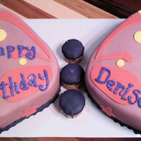 Butterfly Birthday Cake Butterfly shaped birthday cake, covered and decorated in fondant.