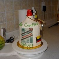 Aguardiente Bottle Cake 1st time making a bottle cake, was a little scared but I've always wanted to attempt to make one. my husbands uncle was having a...
