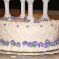 Dscf0056.jpg First tiered cake! It needs work, but over all I think it turned out ok.