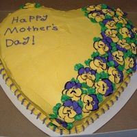 Mothersdaycake1.jpg Yellow cake, butterceam icing, royal pansies.