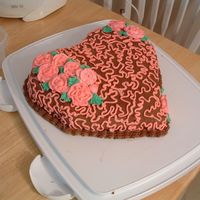 Valentine's Day Cake Double Fudge Cake. Chocolate buttercream, and Peanut butter filling, and Buttercream roses.