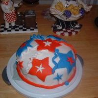 Firecracker Cake Yellow cake with buttercream icing covered in marshmallow fondant.