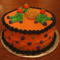 Halloween Clown Cake. This cake was for Course 1, Class 3. The clown heads kind of freaked me out so I used candy pumpkins. :) I also used cream cheese frosting...