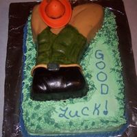 Cowboy Taking A Nap bottom layer is choc. covered with buttercream icing and cowboy is yellow covered in rolled buttercream icing i cheated on the hat sence it...