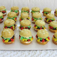 Hamburger Cupcakes Very fun to do! Cupcakes split in half with smashed up brownies for the patty. Condiments are buttercream icing and the cheese is fondant....