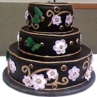 Butterfly Wedding Cake Cake for az cake show, I did not win , but I thought it was pretty. Black fondant with gold accents, and sugar butterflies, fondant flowers...