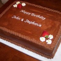 Half Sheet Birthday Cake This is a half sheet size birthday cake, double layer chocolate cake with a chocolate buttercream icing. Decorated very simply, and with...