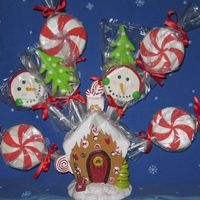 Christmas Cookies I got this cute candle holder from Michael's last year after Christmas for a $1!It's already got the holes for the cookie sticks...