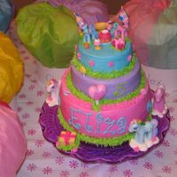Eliza's Birthday Cake My horse and pony loving daughter's 5th birthday cake.Chocolate and yellow cake with buttercream frosting and My Little Pony toys for...
