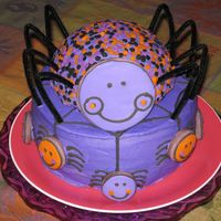 Happy Spider Cake I made this cake for my DD's Girl Scout troop party today. Buttercream icing withdecorated sugar cookie spiders. Black details are...