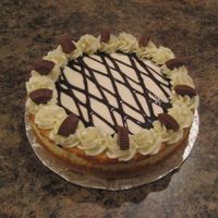 Peanut Butter Cup Cheesecake I make a small batch of cream cheese icing to decorate this one. I put a thin layer on the top of the whole cake, not only does it taste...