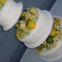 Lemons And Limes 3 tier white cake with lemon and buttercream filling, the brides theme was of course, lemons and limes, and she gave out lemon and...