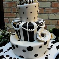 Black & White Stripes Topsy turvy cake for the cutest wedding I've seen in a long time. The cake was chocolate with raspberry buttercream. TFL!
