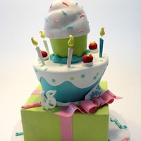 Cupcake Birthday Cake was for a customer whose birthday is on Christmas day and apparently, she's never had a "real" birthday cake. I have to...