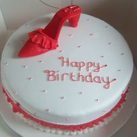 Shoe Cake Chocolate cake covered in sugarpaste with sugarpaste shoe and frills. I was asked to do this cake with only 2 days notice, and it is my...