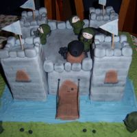 Fort Vanilla cake covered in sugarpaste with sugarpaste accents.